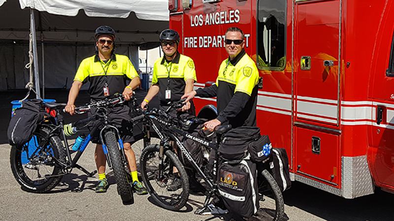 LAFD Firefighters standing in front of bicycles, as an advanced life support (ALS) Cycle Teams 