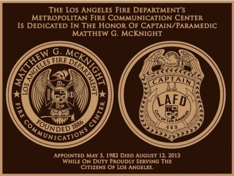 Honoring Mathew G McKnight black and gold plaque