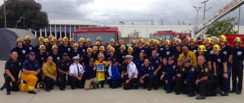 Noah surrounded by a group of LAFD Recruits