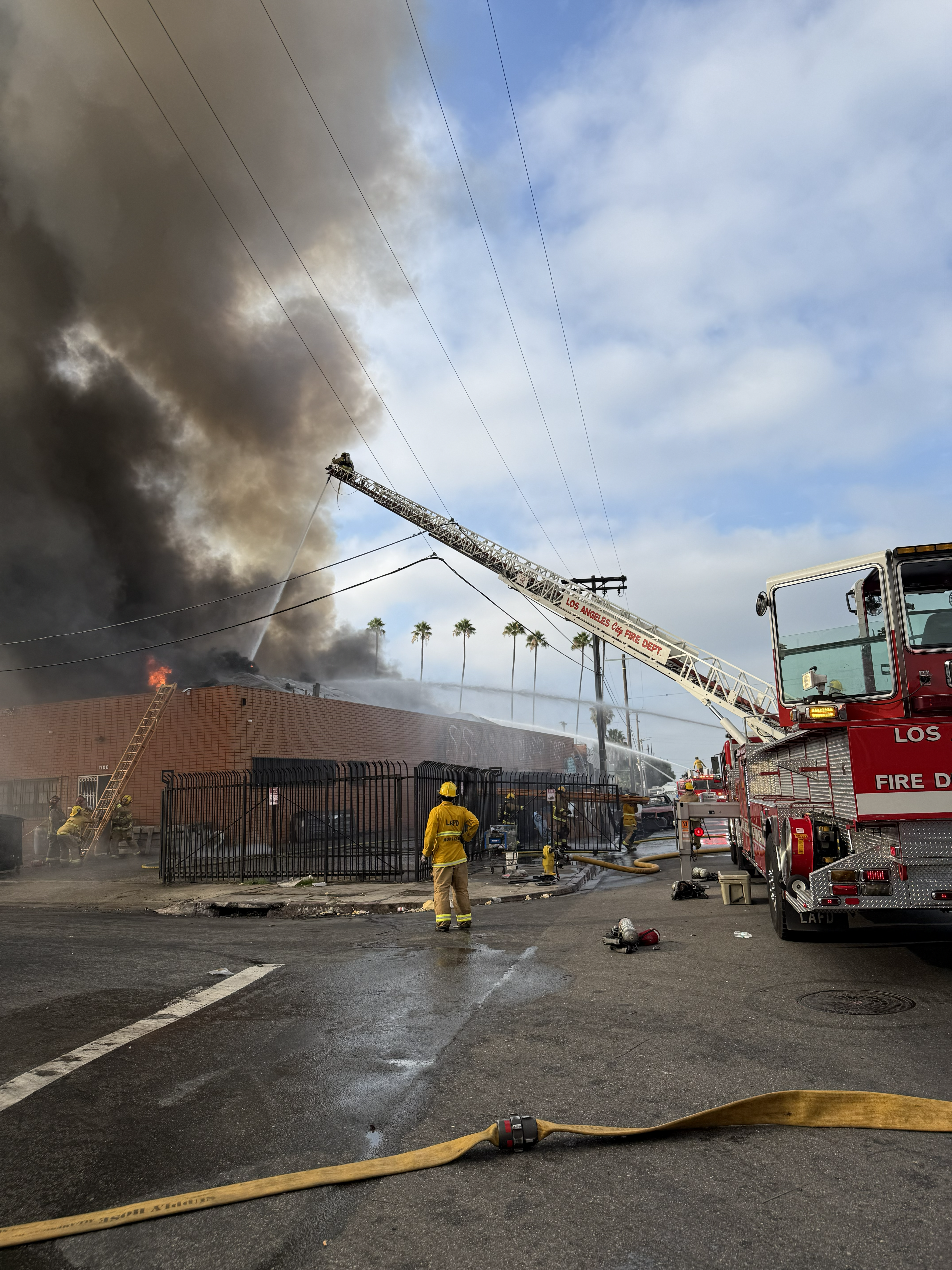 LAFD firefighters transitioned to a defensive fire fighting posture. They utilized heavy streams from a aerial ladders, called ladder pipes.