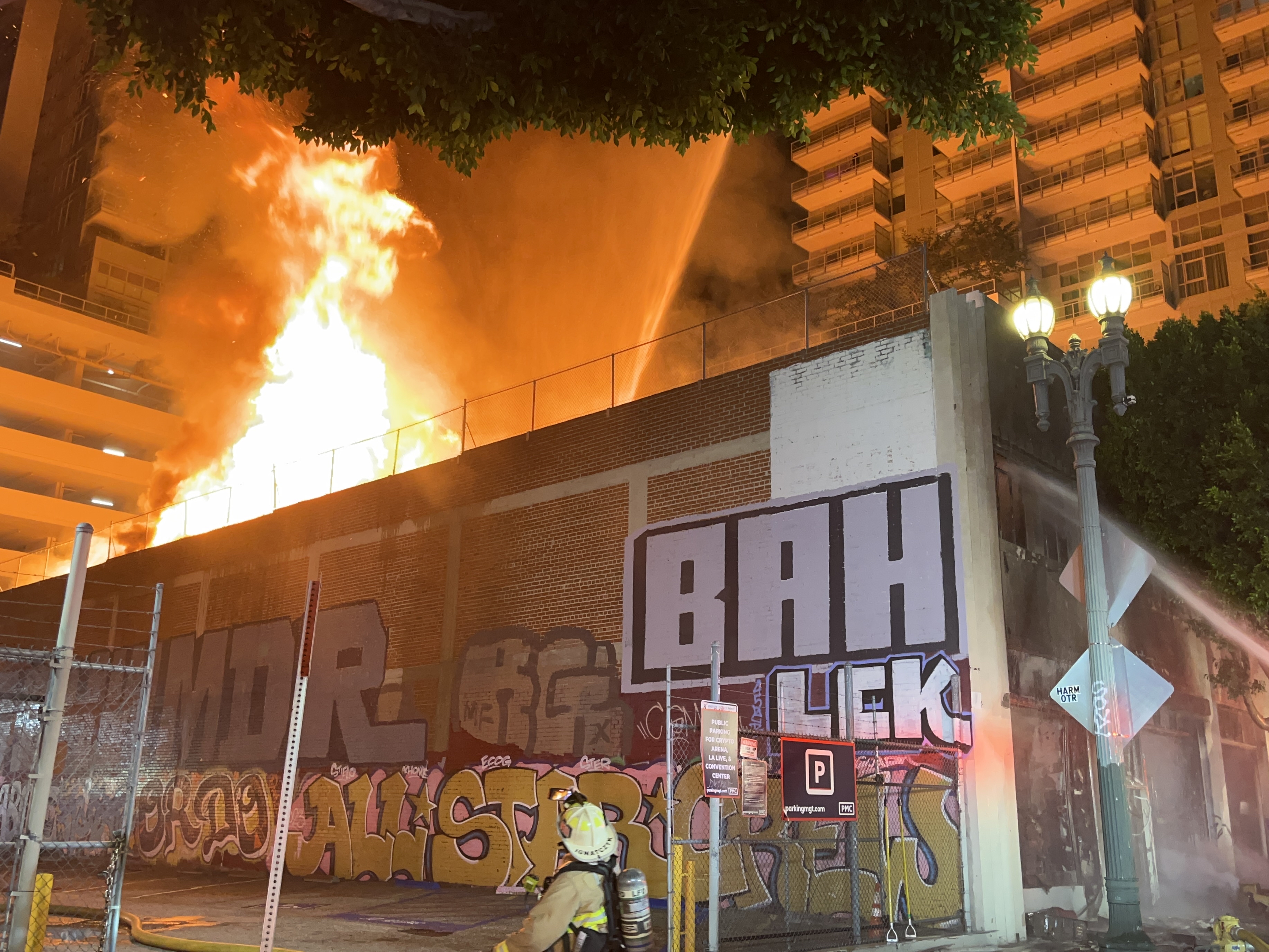 Defensive attack on a Major Emergency structure fire in downtown Los Angeles using ladder pipes and heavy streams.  Photo Credit: LAFD Captain Cody Weireter