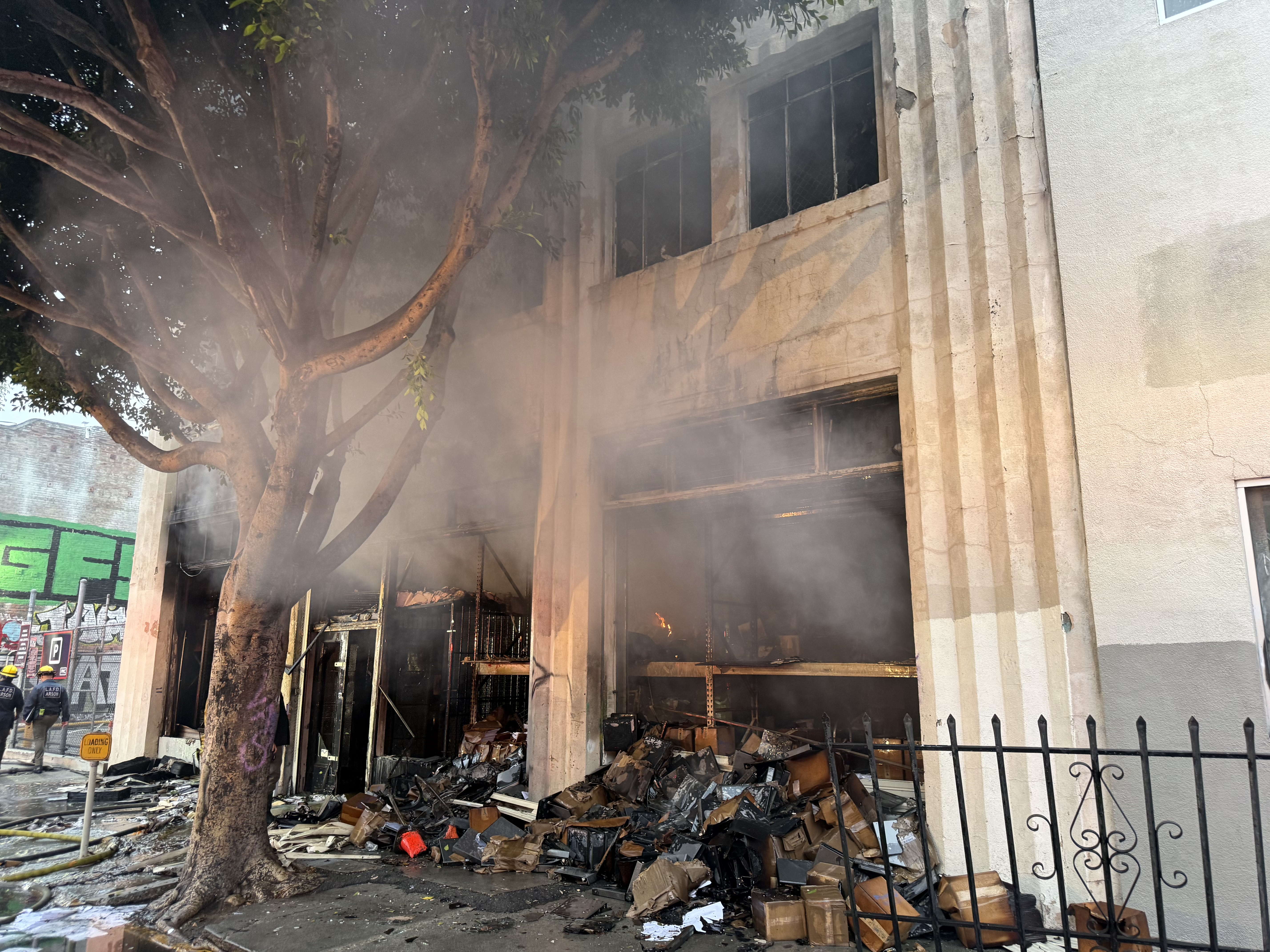 Front of the commercial fire in downtown Los Angeles prior to overhaul operations.  Photo Credit:  LAFD Captain II Cody Weireter