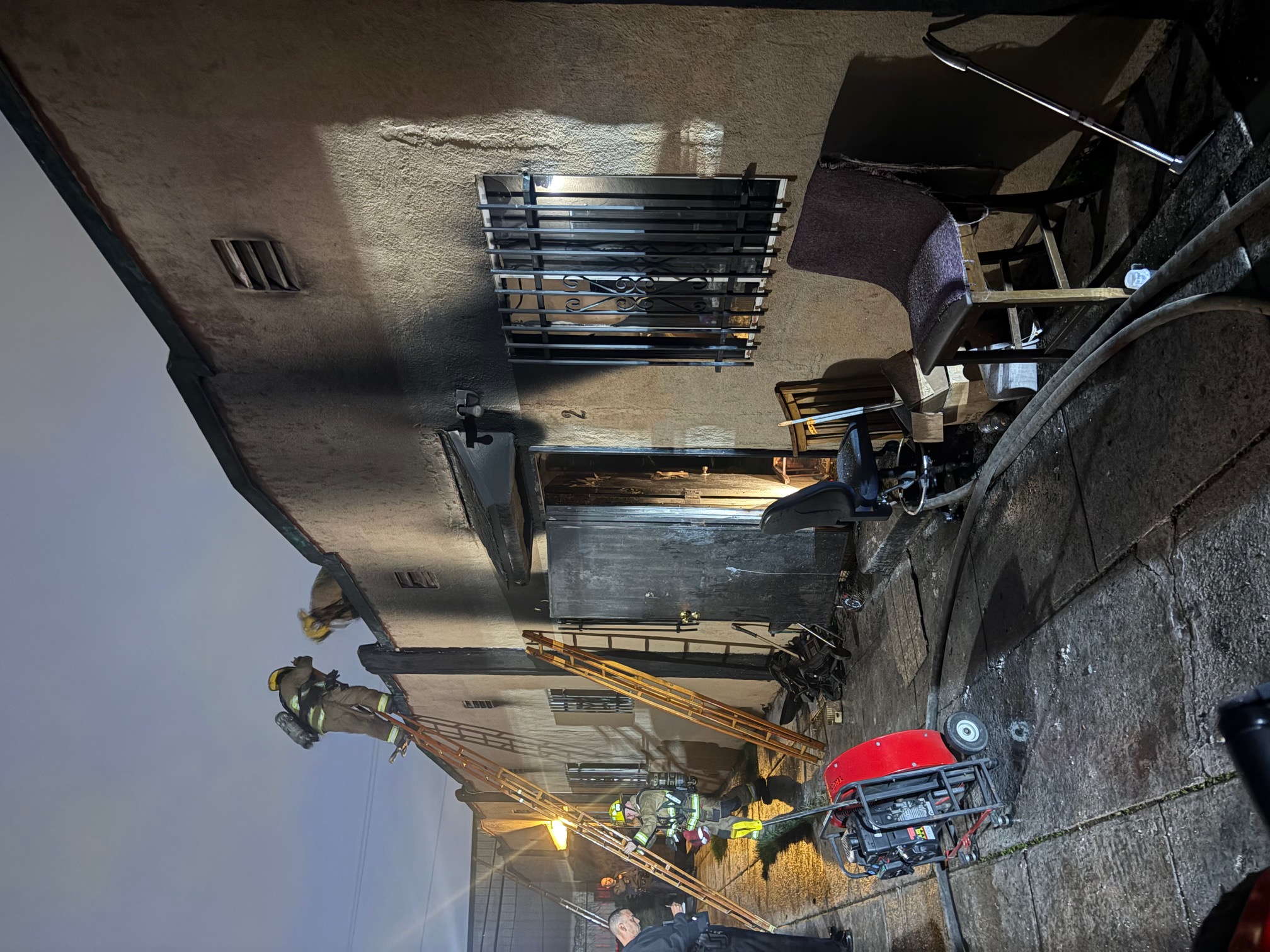 Outside of the bungalow that was on fire