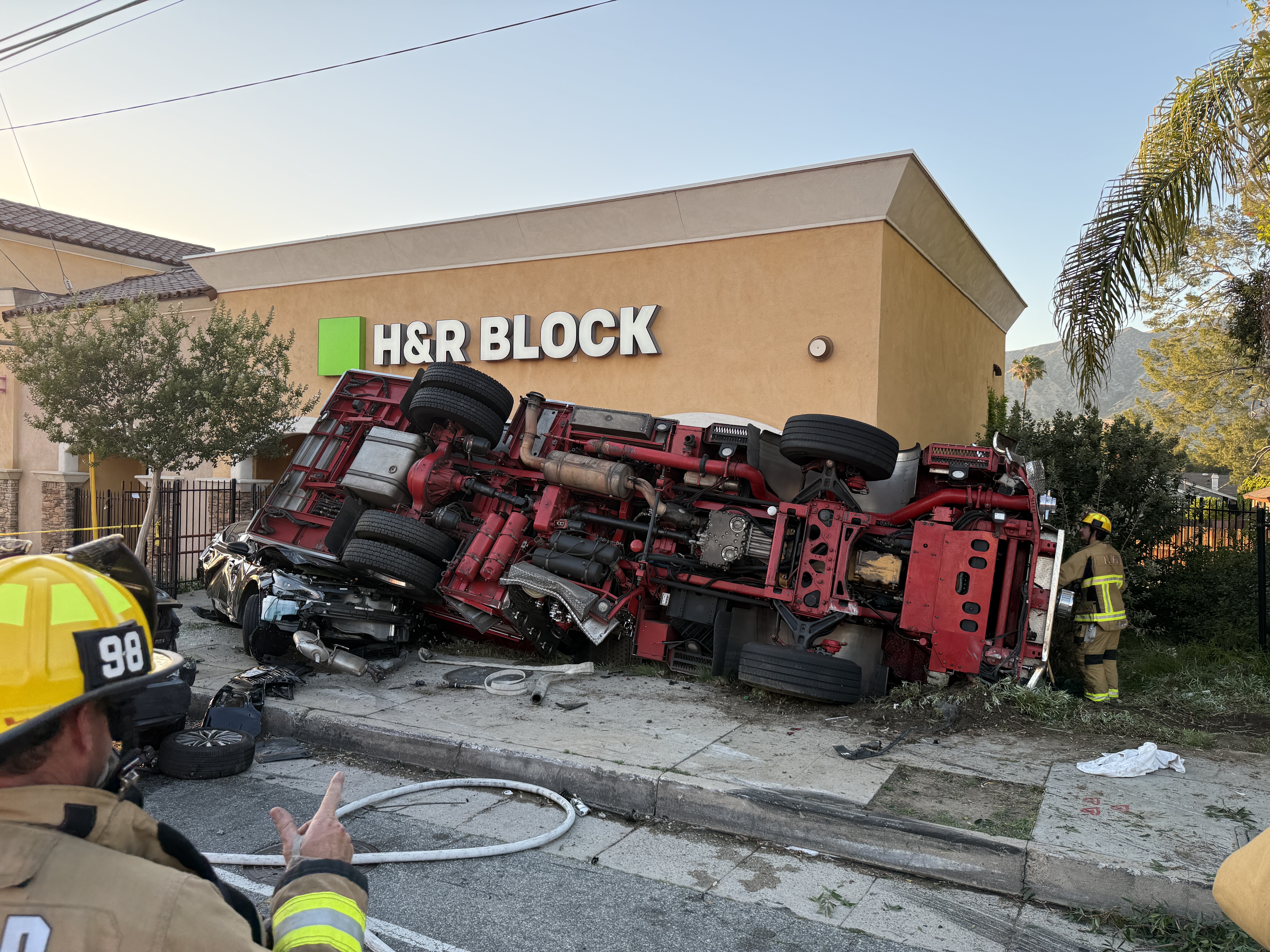 Picture of an overturned fire engine lying on it's side